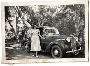 Photo image of Margo Williams with car in Africa